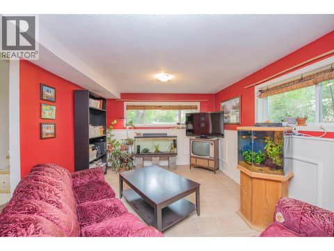 Large family room - basement at 33 Birch Road, Lumby Valley