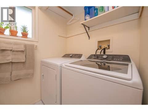 Main Floor Laundry at 33 Birch Road, Lumby Valley