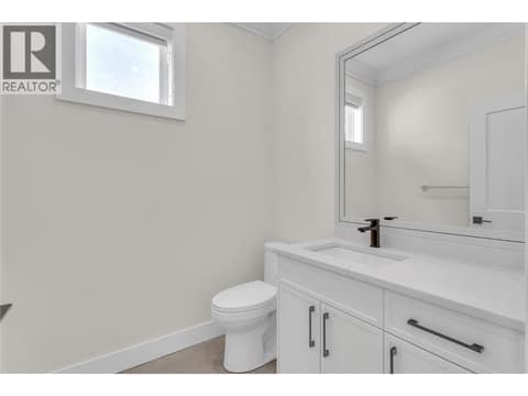 Half Bathroom Near Entry at 19950 McCarthy Road Unit# 25, Lake Country North West