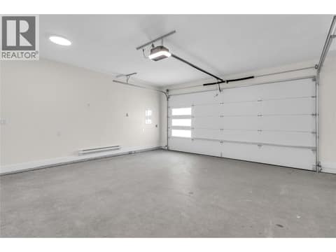 Heated Double Car Garage with EV Charger Hookup at 19950 McCarthy Road Unit# 25, Lake Country North West