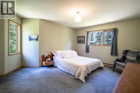Upper Floor Level: #1 Primary Bedroom with Ensuite at 187 Gibson Road, Lumby Valley