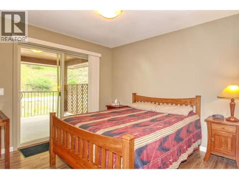Main floor bed 1 at 6834 Madrid Way Unit# 316, Fintry, Kelowna