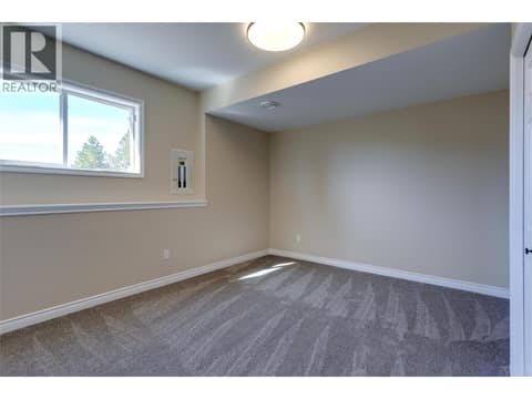 Bedroom dowm at 1084 Aurora Heights, West Kelowna Estates