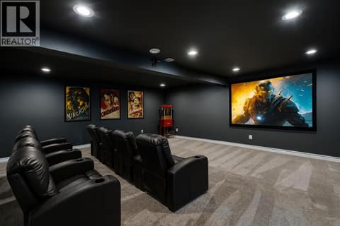 Media room virtually staged at 1084 Aurora Heights, West Kelowna Estates