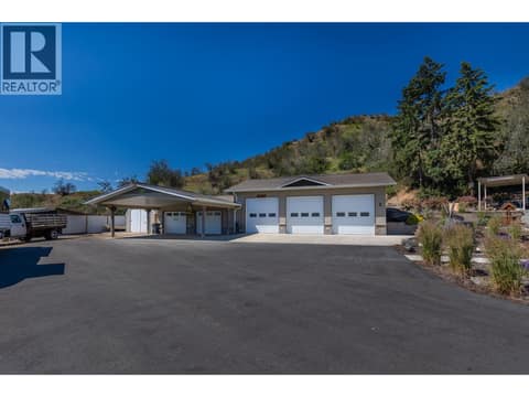 5 Car Garage has triple bay shop, workshop & paint booth in one side.  Covered parking in the 2 car carport at 6902 Old Kamloops Road, Swan Lake West, Vernon