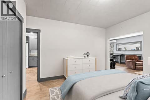 Bedroom Downstairs Virtually Staged at 6902 Old Kamloops Road, Swan Lake West, Vernon