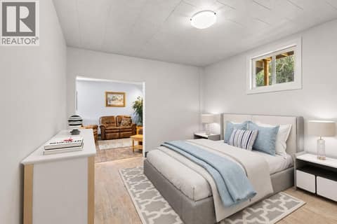 Bedroom Downstairs Virtually Staged at 6902 Old Kamloops Road, Swan Lake West, Vernon