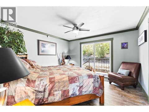 Primary bedroom upstairs at 6902 Old Kamloops Road, Swan Lake West, Vernon