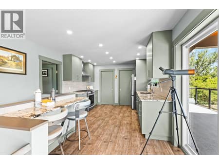 Updated kitchen with SS Appliances at 6902 Old Kamloops Road, Swan Lake West, Vernon