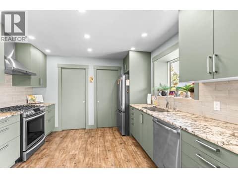 Updated kitchen with SS Appliances at 6902 Old Kamloops Road, Swan Lake West, Vernon