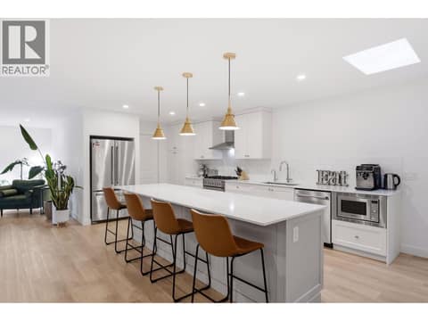 Gas stove, open floor plan at 16515 Commonage Road, Lake Country North West