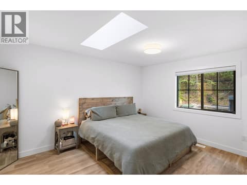 Primary bedroom with ensuite at 16515 Commonage Road, Lake Country North West