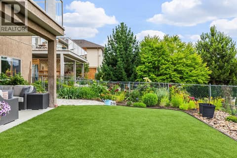 3069 Bridlehill Drive - easy-maintenance yard with syn-lawn at 3069 Bridlehill Drive, Smith Creek, West Kelowna