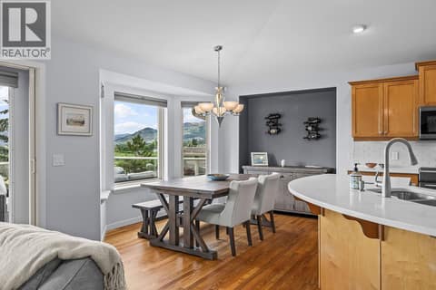 Dining area with views at 3069 Bridlehill Drive, Smith Creek, West Kelowna