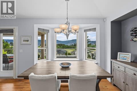 Dining area with views at 3069 Bridlehill Drive, Smith Creek, West Kelowna