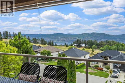 Main floor covered portion of patio with views at 3069 Bridlehill Drive, Smith Creek, West Kelowna