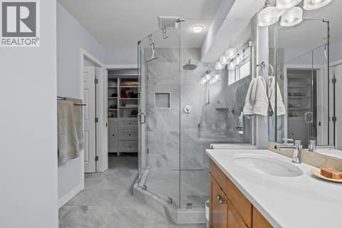 Main floor primary ensuite recently updated at 3069 Bridlehill Drive, Smith Creek, West Kelowna