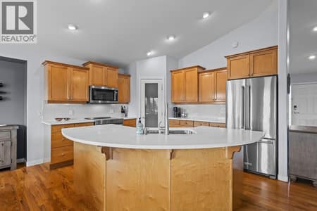 Spacious kitchen with large island at 3069 Bridlehill Drive, Smith Creek, West Kelowna