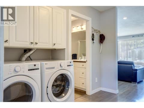 From entry area towards full bathroom on main floor at 4109 24 Avenue, South Vernon