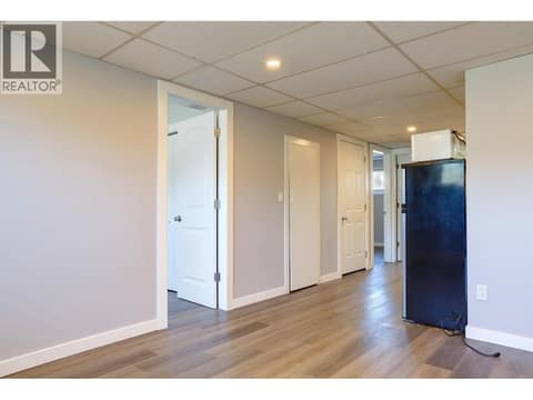 Living room towards from bedroom in basement suite at 4109 24 Avenue, South Vernon