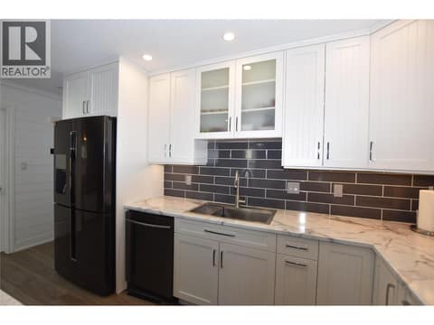 Black stainless steel appliances at 562 Meadowlark Avenue, Okanagan North, Vernon