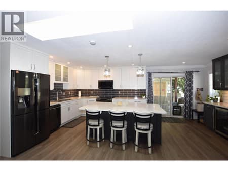 Fabulous kitchen with a huge island at 562 Meadowlark Avenue, Okanagan North, Vernon