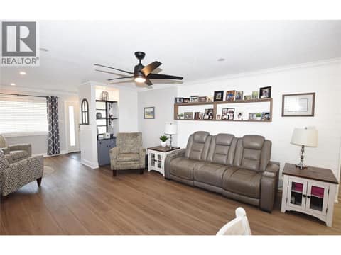 Living room area at 562 Meadowlark Avenue, Okanagan North, Vernon