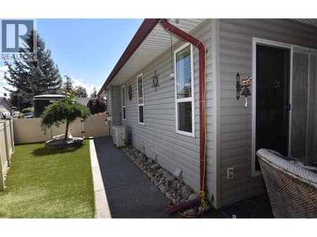 Side yard at 562 Meadowlark Avenue, Okanagan North, Vernon