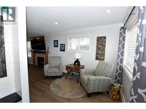 To your right is a sitting area at 562 Meadowlark Avenue, Okanagan North, Vernon