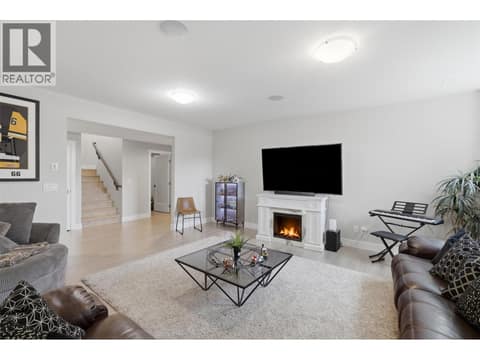 Lower floor family room at 233 RUE CHEVAL NOIR, Tobiano, Kamloops