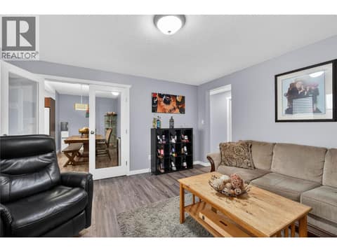 Downstairs living room at 7292 Mountridge Road, North BX, Vernon