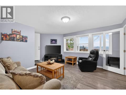 Downstairs living room at 7292 Mountridge Road, North BX, Vernon