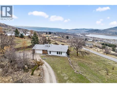 Just over an acre with lakeview at 7292 Mountridge Road, North BX, Vernon