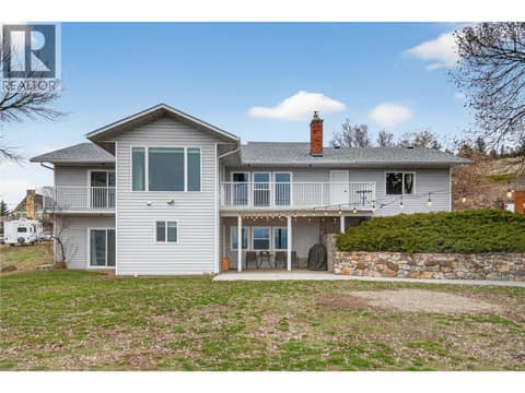Just over an acre with lakeview at 7292 Mountridge Road, North BX, Vernon