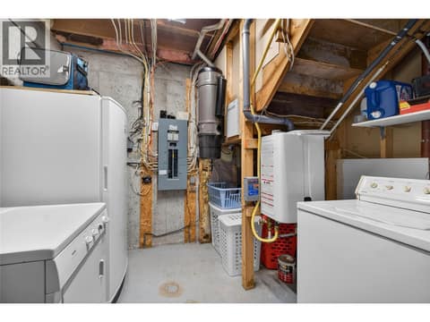 Utility / laundry room down at 7292 Mountridge Road, North BX, Vernon