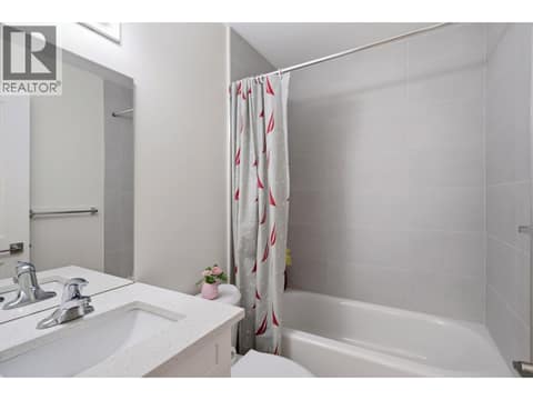 Bathroom with a tub at 4004 34 Street Unit# 207 Lot# 15, Alexis Park, Vernon