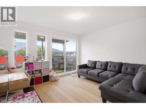 Bright Living room with private balcony at 4004 34 Street Unit# 207 Lot# 15, Alexis Park, Vernon