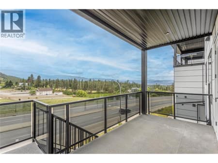 Deck off Living Room, Dining Room and Kitchen at 1152 Hume Avenue, Black Mountain, Kelowna