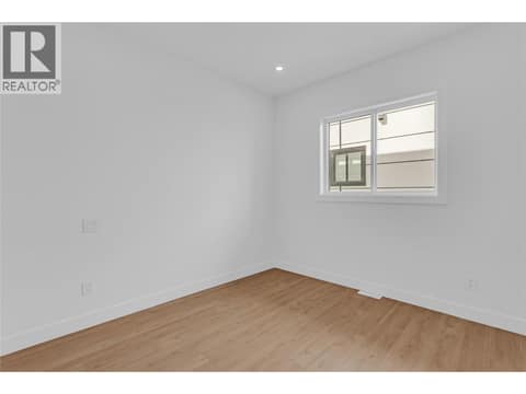 Main Floor Bedroom at 1152 Hume Avenue, Black Mountain, Kelowna