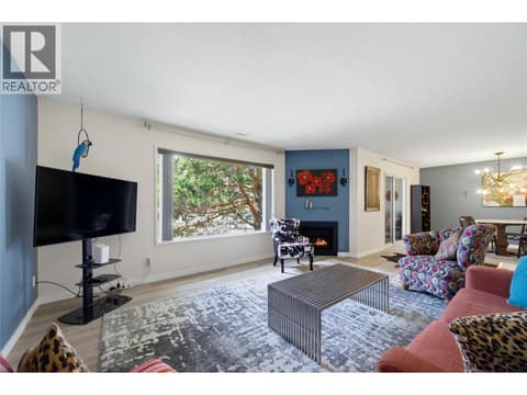 Fireplace has been virtually altered to have a flame at 2806 35 Street Unit# 207, City of Vernon