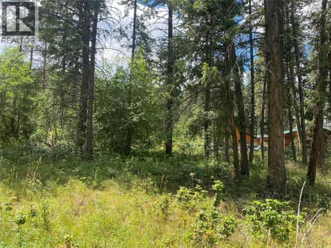 Flat lot with front AND back access at 867 Balsam Road, Fintry, Kelowna