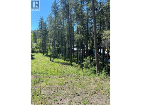 Flat lot with front AND back access at 867 Balsam Road, Fintry, Kelowna