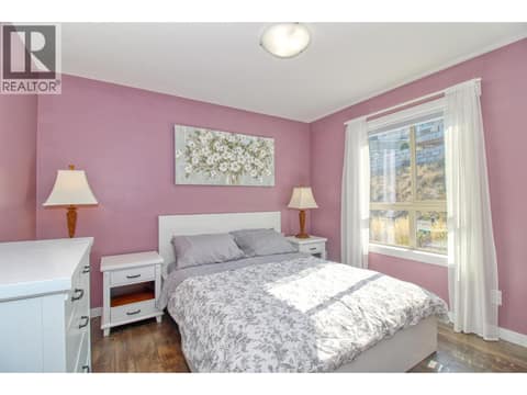 Main floor bed 1 at 6933 Barcelona Drive Unit# 64, Fintry, Kelowna