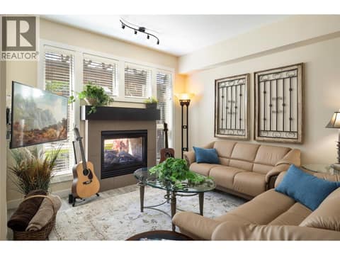 Living Room with 2 sided fireplace at 7343 Okanagan Landing Road Unit# 1130, Okanagan Landing, Vernon