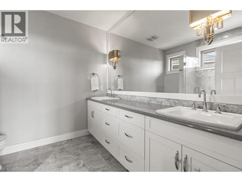 Primary ensuite at 246 Dormie Place, Predator Ridge, Vernon