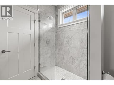 Primary ensuite at 246 Dormie Place, Predator Ridge, Vernon