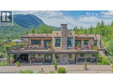 Custom Built home nestled over Mabel Lake at 1309 Eagle Ridge Road, Mabel Lake South, Lumby