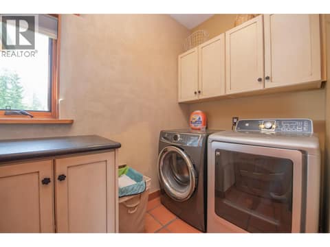 Main Floor Laundry at 1309 Eagle Ridge Road, Mabel Lake South, Lumby