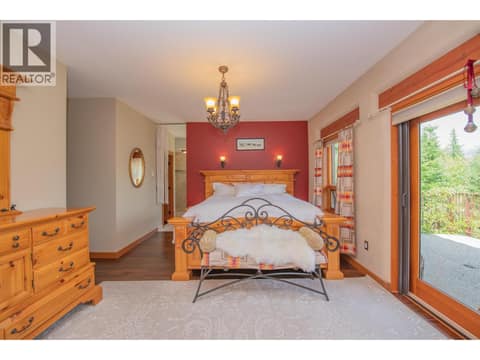 Main Floor Master Bedroom at 1309 Eagle Ridge Road, Mabel Lake South, Lumby