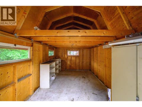 Inside the big red storage barn at 5008 Heritage Drive, Westmount, Vernon